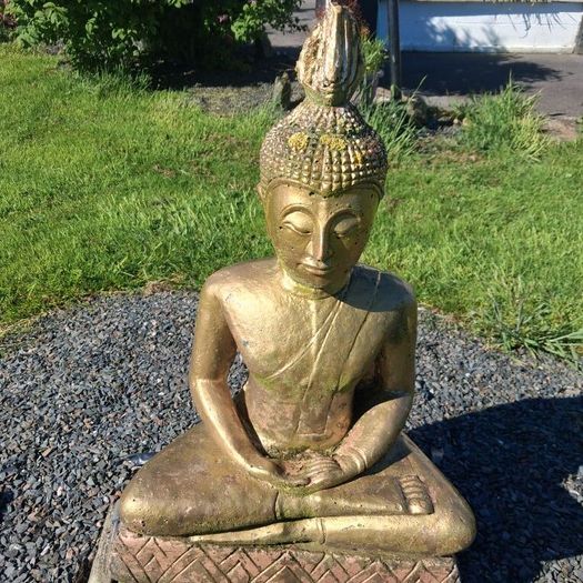 3 stone garden ornaments as seen