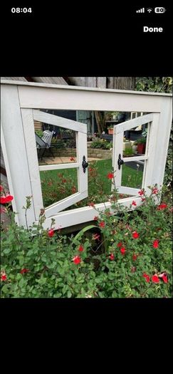 Garden reflection mirror window.