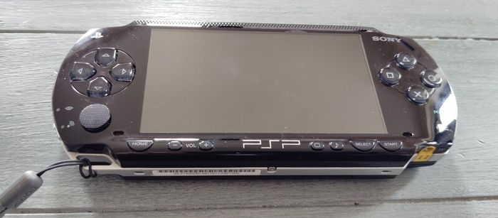 Psp 1000 Modded 64gb 40 psp original charger Excellent condition