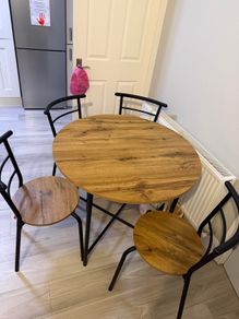 brand new table and four chairs