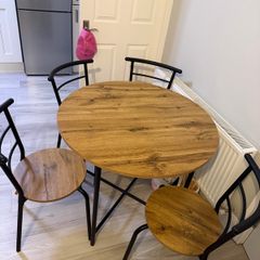 brand new table and four chairs