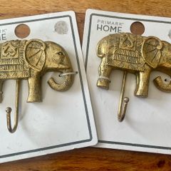 Brand new 2 Gold elephant clothes hangers