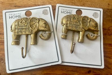 Brand new 2 Gold elephant clothes hangers