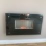 Modern wall-mounted electric fire. Image 2