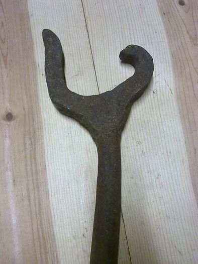 Old Irish blacksmith made wheelwright's tyre dog