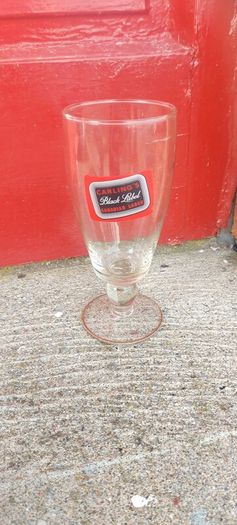 carling black label glass,rare glass,,price includes post to anywhere in Ireland thank you, or if buyer collects cheaper,sold as seen.