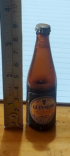 Vintage original Guinness miniature advertising bottle,with liquid inside some of of it must of evaporate,,hard to come by ,price includes free shipping within Ireland thank you, sold as seen, see pictures,,