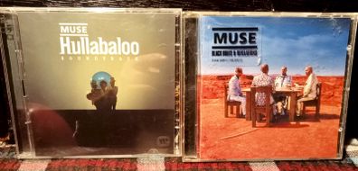 Muse. Soundtrack And Black Holes And Revelations. CDs.