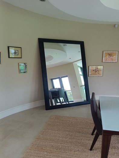 floor standing black mirror 137cm w x 242 h