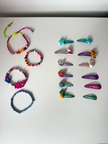Assortment of girls hair clips and Braclets