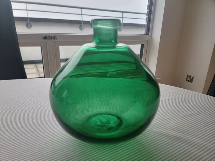 Large green glass vase