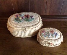 A Pair Of Graduating Vintage Sewing Baskets