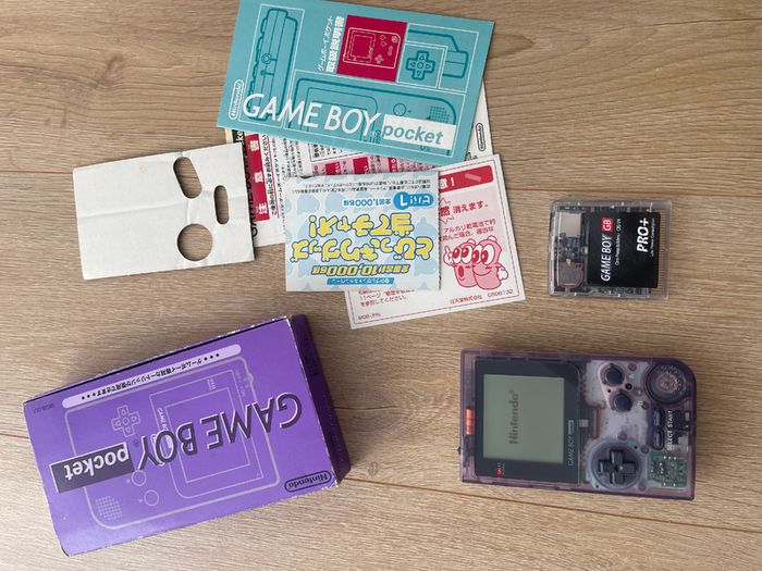 Nintendo Gameboy Pocket MGB-001 Clear Purple Boxed with Manual and Flash Card 4 GB included all the games