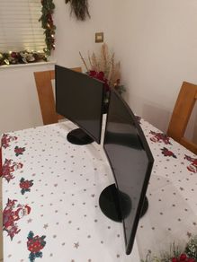 Two Samsung curved Monitors.