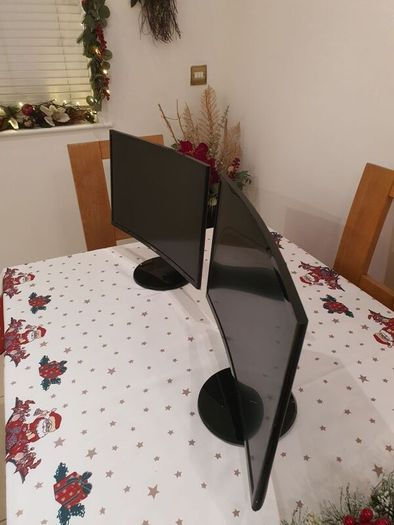Two Samsung curved Monitors.