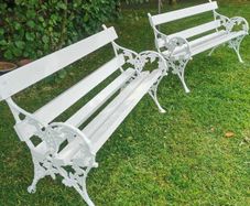 2 garden benches with heavy victorian cast iron ends