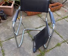 Classic cantilever chair needs restoration