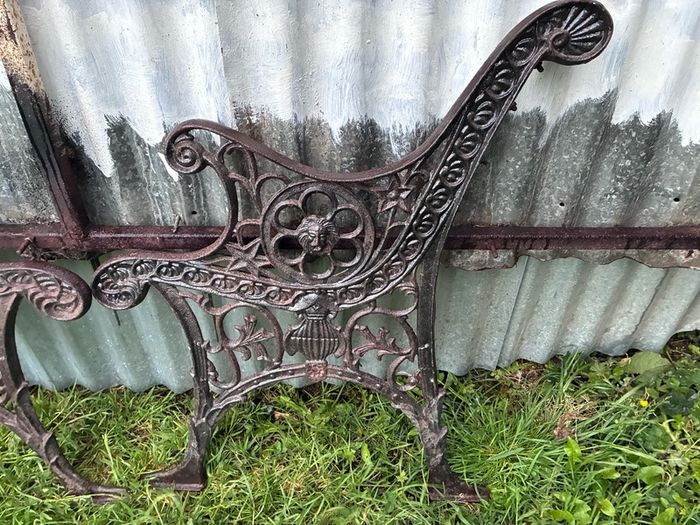 Pair of decorative cast iron bench ends