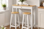Dining table with two stools