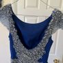 Debs dress for sale. Royal blue debs dress. Size 6 but would fit UK size 8. Freshly dry cleaned. Some loose thread on the back but otherwise in good condition. Image 3