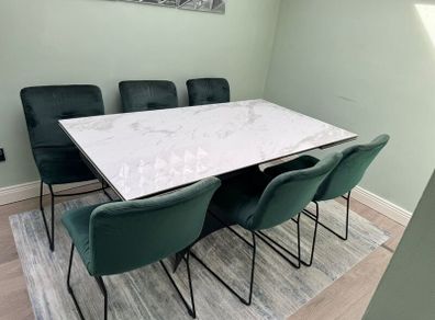 Extendable dining table with six chairs