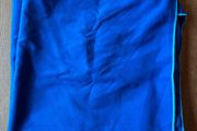 Blue quick dry towel from Xenos. Lightweight and compact, ideal for travel, gym, swimming or camping.