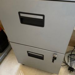 Small grey filing cabinet