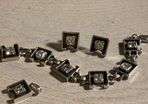 Silver set of bracelet ,earrings and pendant
