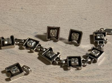 Silver set of bracelet ,earrings and pendant