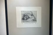 picture etching a figurative sketch of a person resting or sleeping