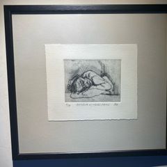 picture etching a figurative sketch of a person resting or sleeping