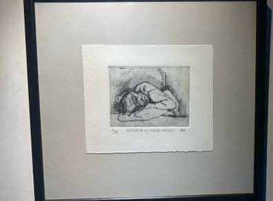 picture etching a figurative sketch of a person resting or sleeping