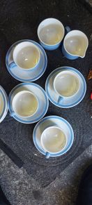 4 cups 4 saucers ,4  side plates ,milk jug ,sugar bowl ,some marked carrigaline, others plain ,buyer collects,,sold as is