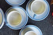 4 cups 4 saucers ,4  side plates ,milk jug ,sugar bowl ,some marked carrigaline, others plain ,buyer collects,,sold as is