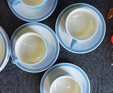 4 cups 4 saucers ,4  side plates ,milk jug ,sugar bowl ,some marked carrigaline, others plain ,buyer collects,,sold as is