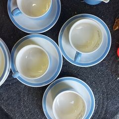 4 cups 4 saucers ,4  side plates ,milk jug ,sugar bowl ,some marked carrigaline, others plain ,buyer collects,,sold as is