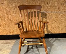 A Late Victorian farmhouse armchair.