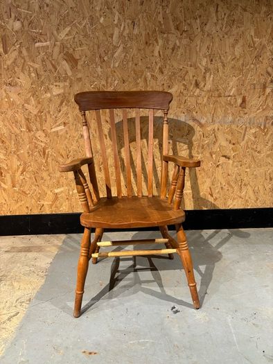 A Late Victorian farmhouse armchair.