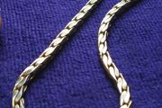 Vintage gold tone chain with beautiful weave.