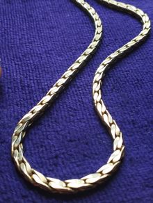 Vintage gold tone chain with beautiful weave.