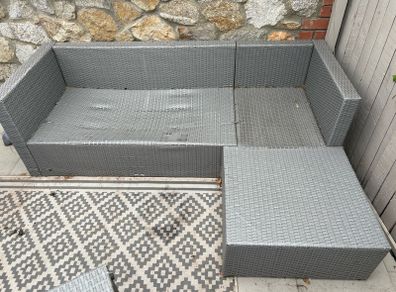 rattan garden sofa with cushions