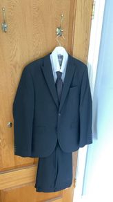 Black suit worn for few hours at funeral