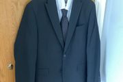 Black suit worn for few hours at funeral