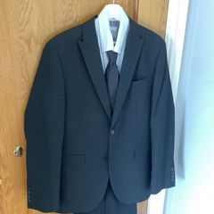 Black suit worn for few hours at funeral