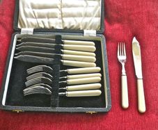 Set of fish knives and forks