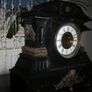 Victorian French Black Slate Mantle Clock (Very large and heavy) with bronze ornamentation Oversized. Open escarpment slate plate Roman numerals. Circa 1890s. Accented with Trojan head. Flanked by two Hellenistic ladies heads on sides. Rose cartouche mask Image 6