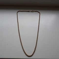 Gold coloured rope chain necklace