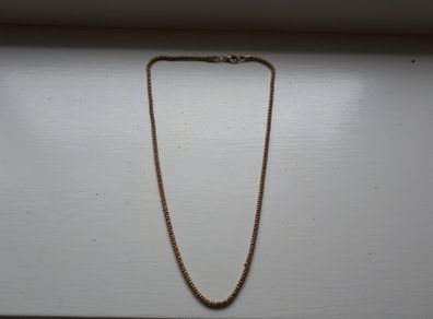 Gold coloured rope chain necklace