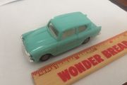Spot-on. Tri-ang. Ford Anglia. Model number 213. Featured in Harry Potter movie.