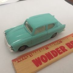 Spot-on. Tri-ang. Ford Anglia. Model number 213. Featured in Harry Potter movie.